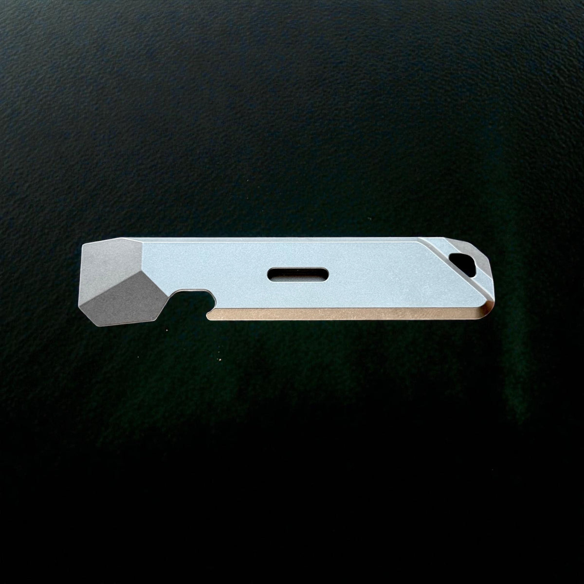 Titanium Pocket Crowbar with Nail Puller & Bottle Opener · 115 mm