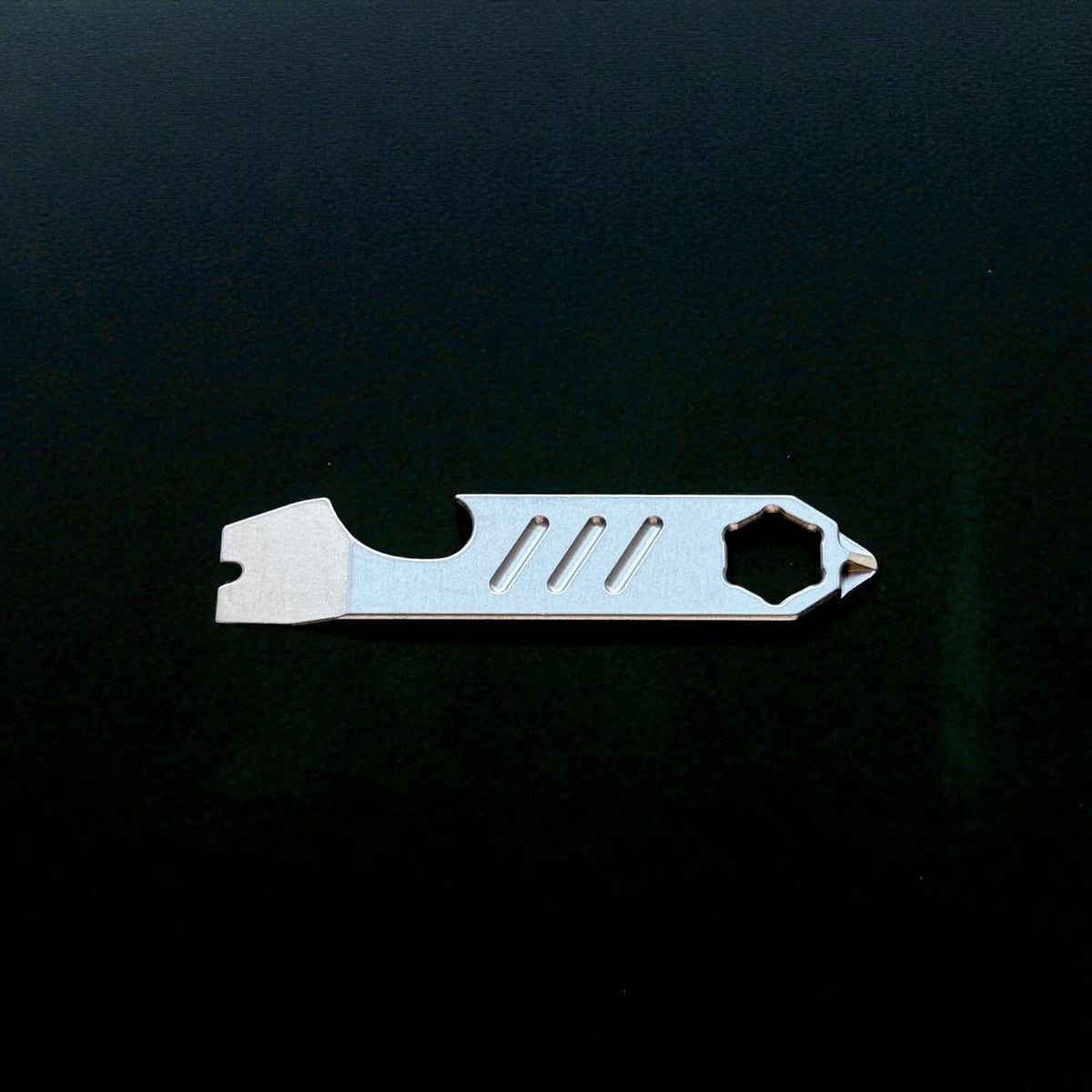 Mini Titanium Pry Bar with Bottle Opener, Nail Puller & Hex Wrench · 75 mm