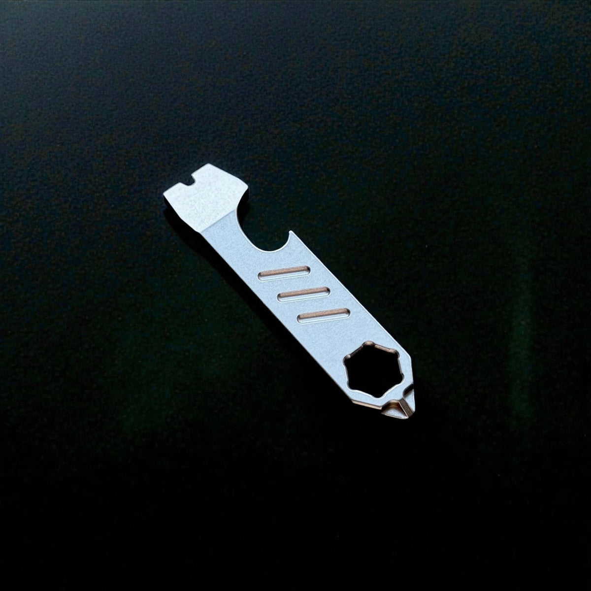 Mini Titanium Pry Bar with Bottle Opener, Nail Puller & Hex Wrench · 75 mm
