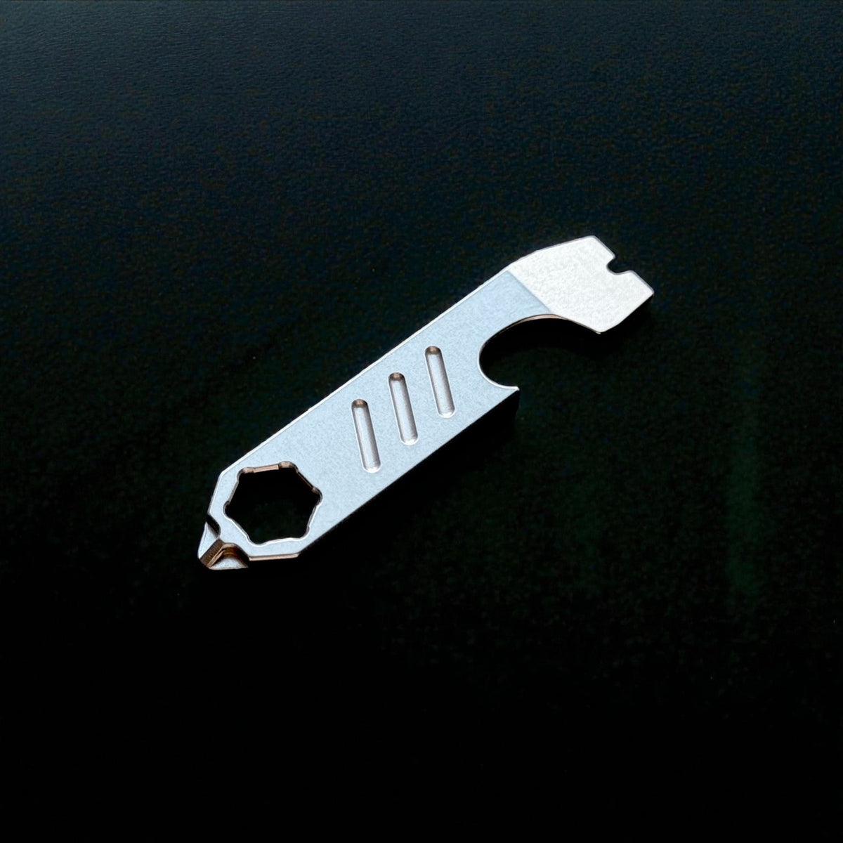 Mini Titanium Pry Bar with Bottle Opener, Nail Puller & Hex Wrench · 75 mm