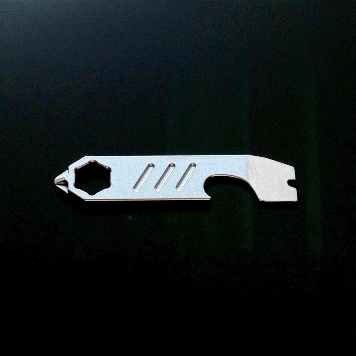 Mini Titanium Pry Bar with Bottle Opener, Nail Puller & Hex Wrench · 75 mm