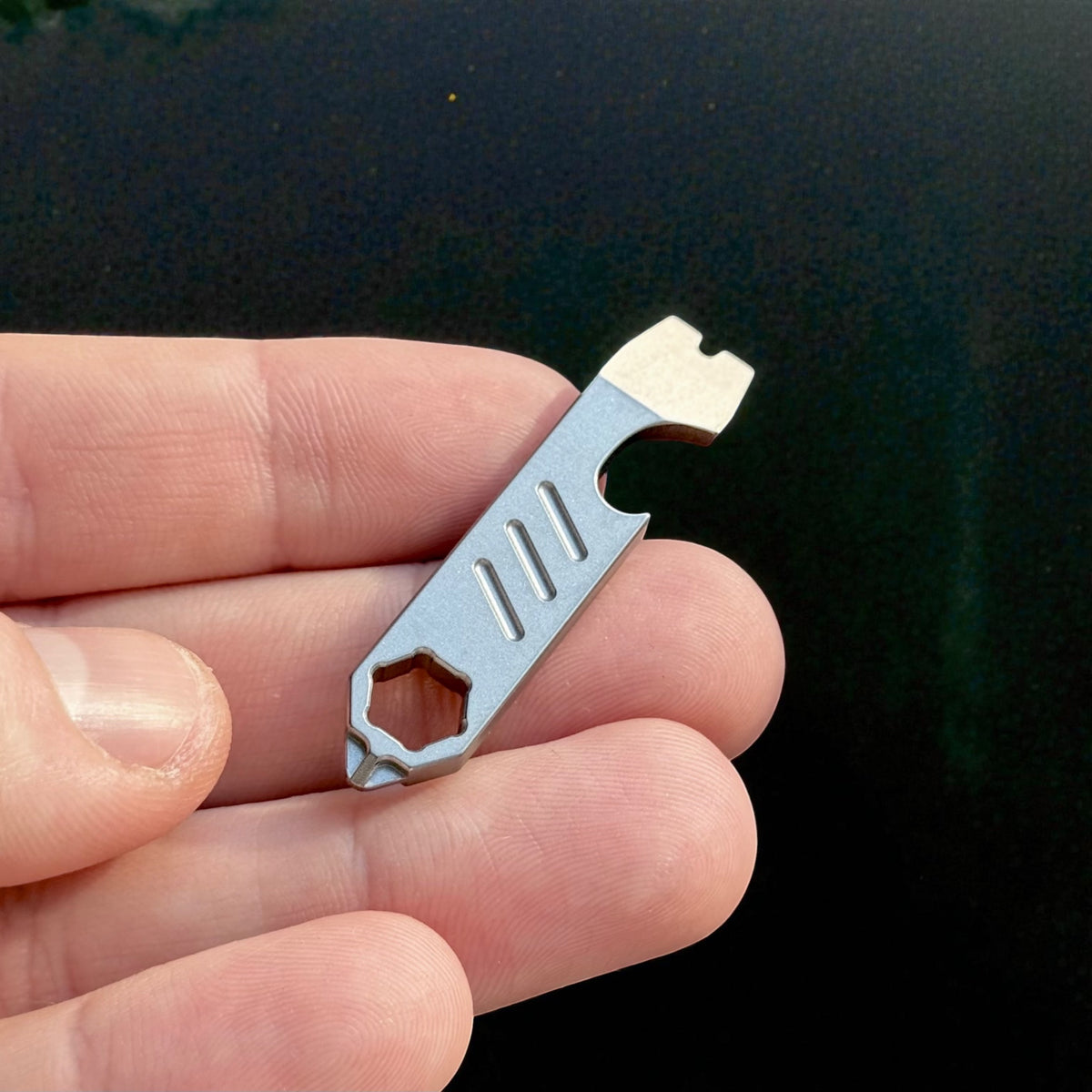 Mini Titanium Pry Bar with Bottle Opener, Nail Puller & Hex Wrench · 75 mm