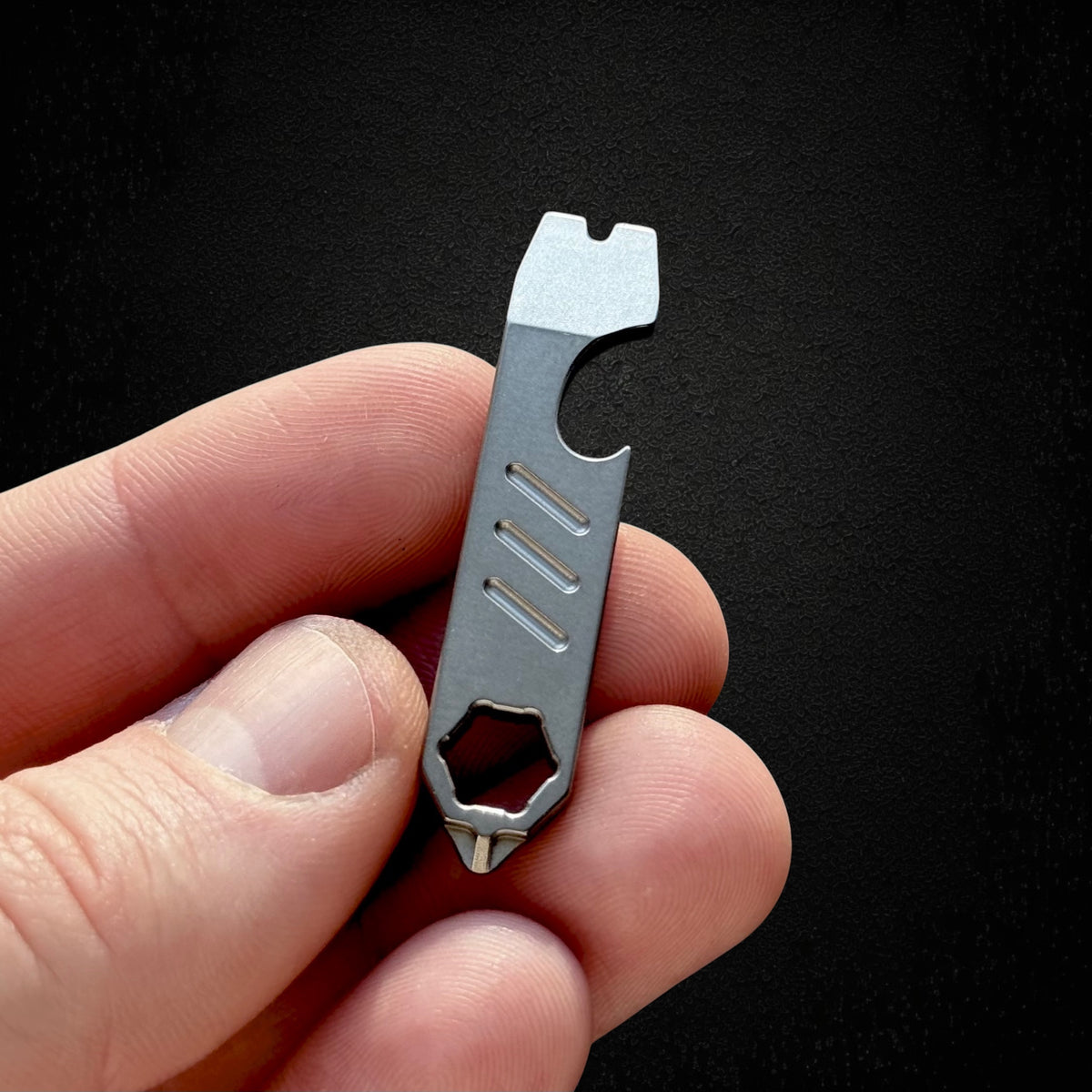 Mini Titanium Pry Bar with Bottle Opener, Nail Puller & Hex Wrench · 75 mm